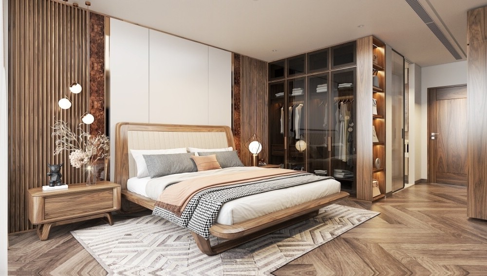 Nội thất phòng ngủ master với giường trung tâm và tủ quần áo kính kịch trần